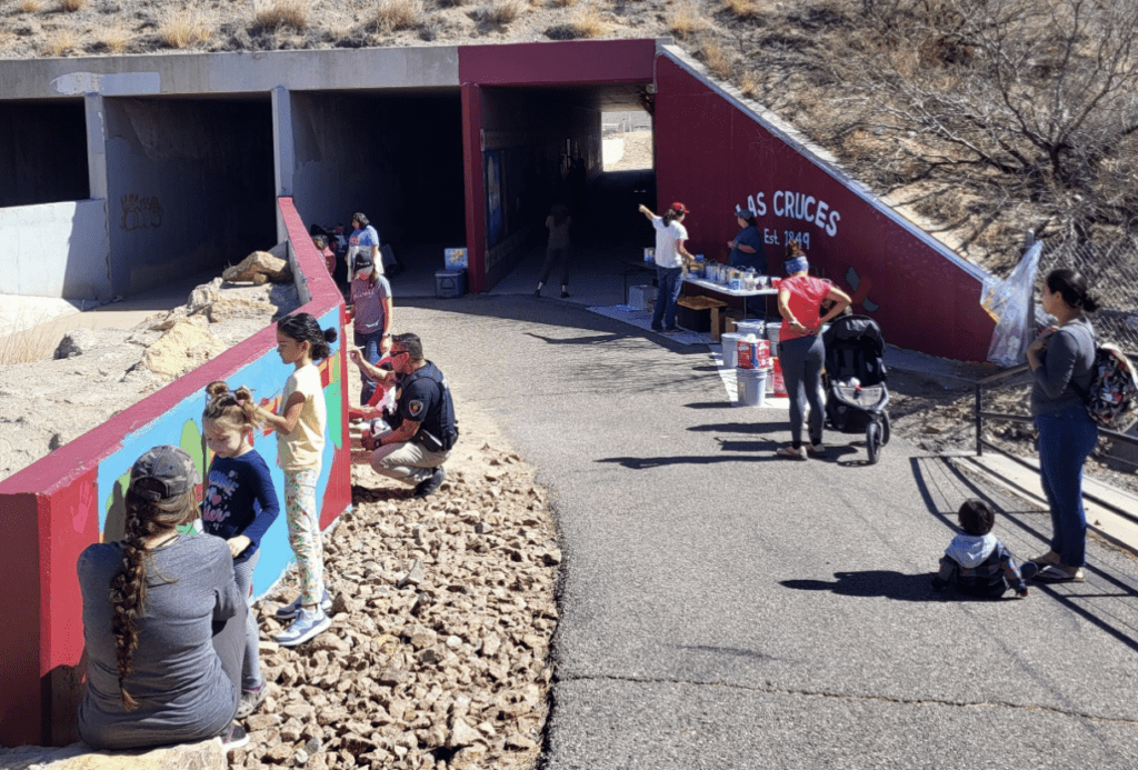 Students working on a mural in Las Cruces